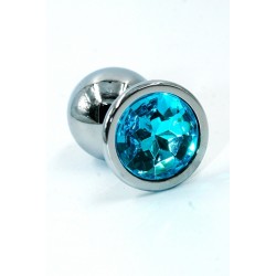 Серебристая хромированная анальная пробка с голубым кристаллом - 7 см. Серебристая хромированная анальная пробка с голубым кристаллом - 7 см.