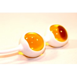 Желтые вагинальные шарики в силиконовой оболочке Желтые вагинальные шарики в силиконовой оболочке